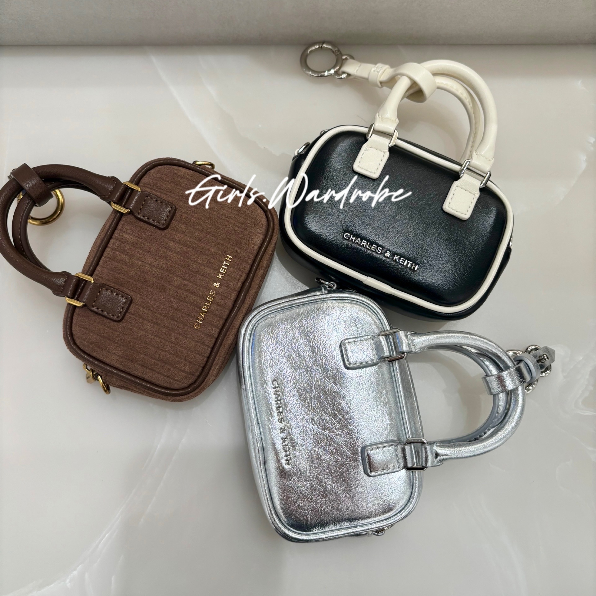 【𝐆𝐢𝐫𝐥𝐬.𝐖𝐚𝐫𝐝𝐫𝐨𝐛𝐞新加坡小CK正品代購】附鍊條超迷你小方包 耳機包 包掛