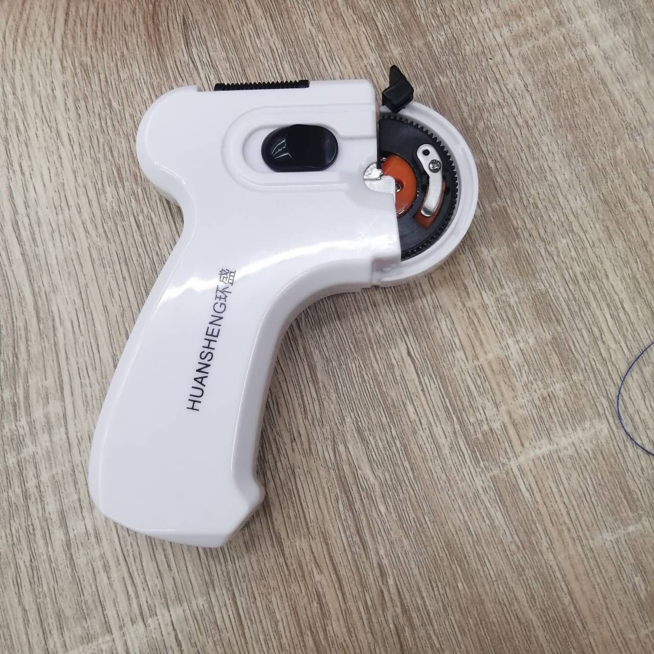 自動綁鉤器