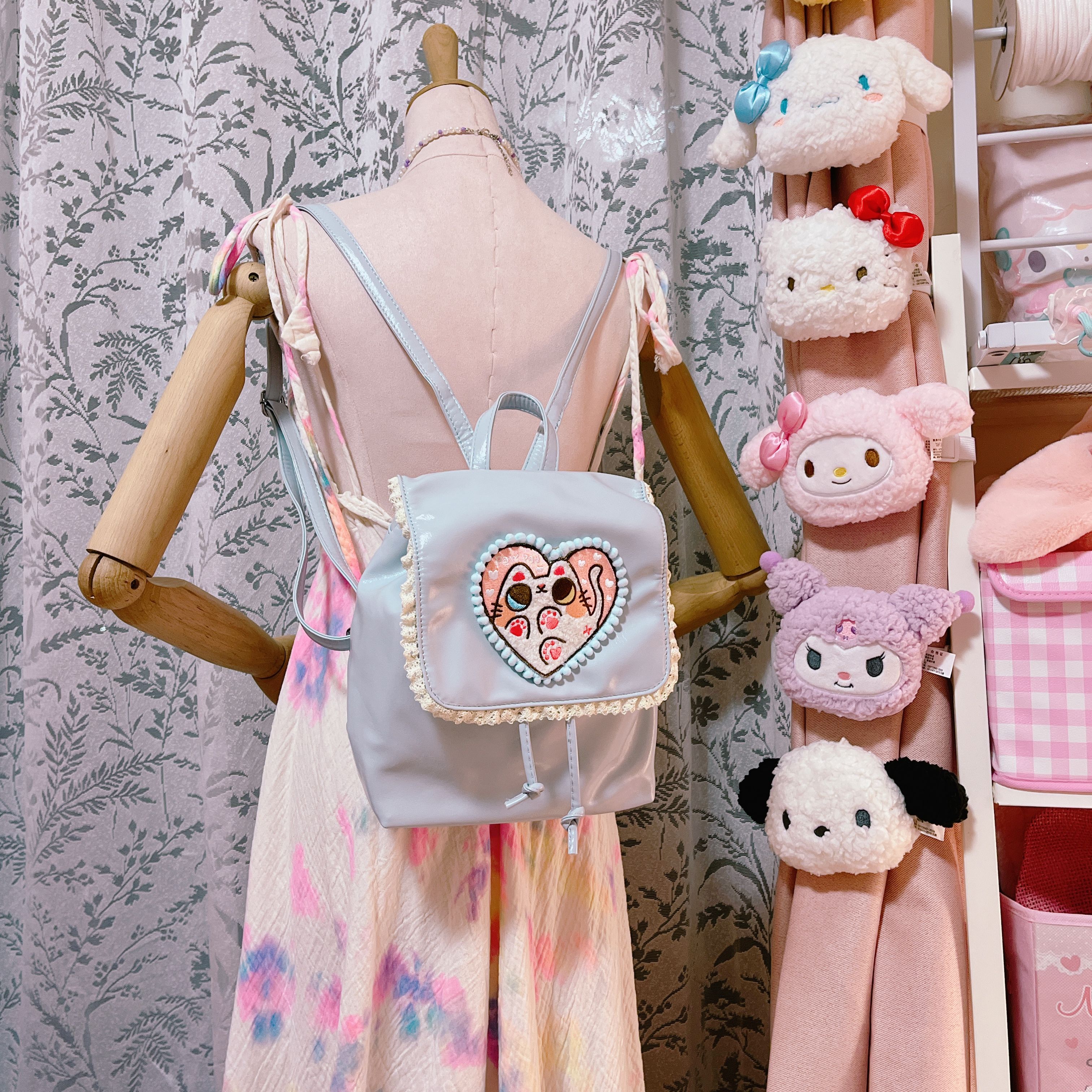 肉球的皮革後背包