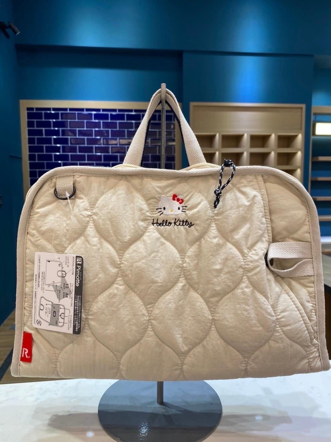 可愛刺繡菱格車紋兩用 13 吋電腦收納包-米色Hello Kitty