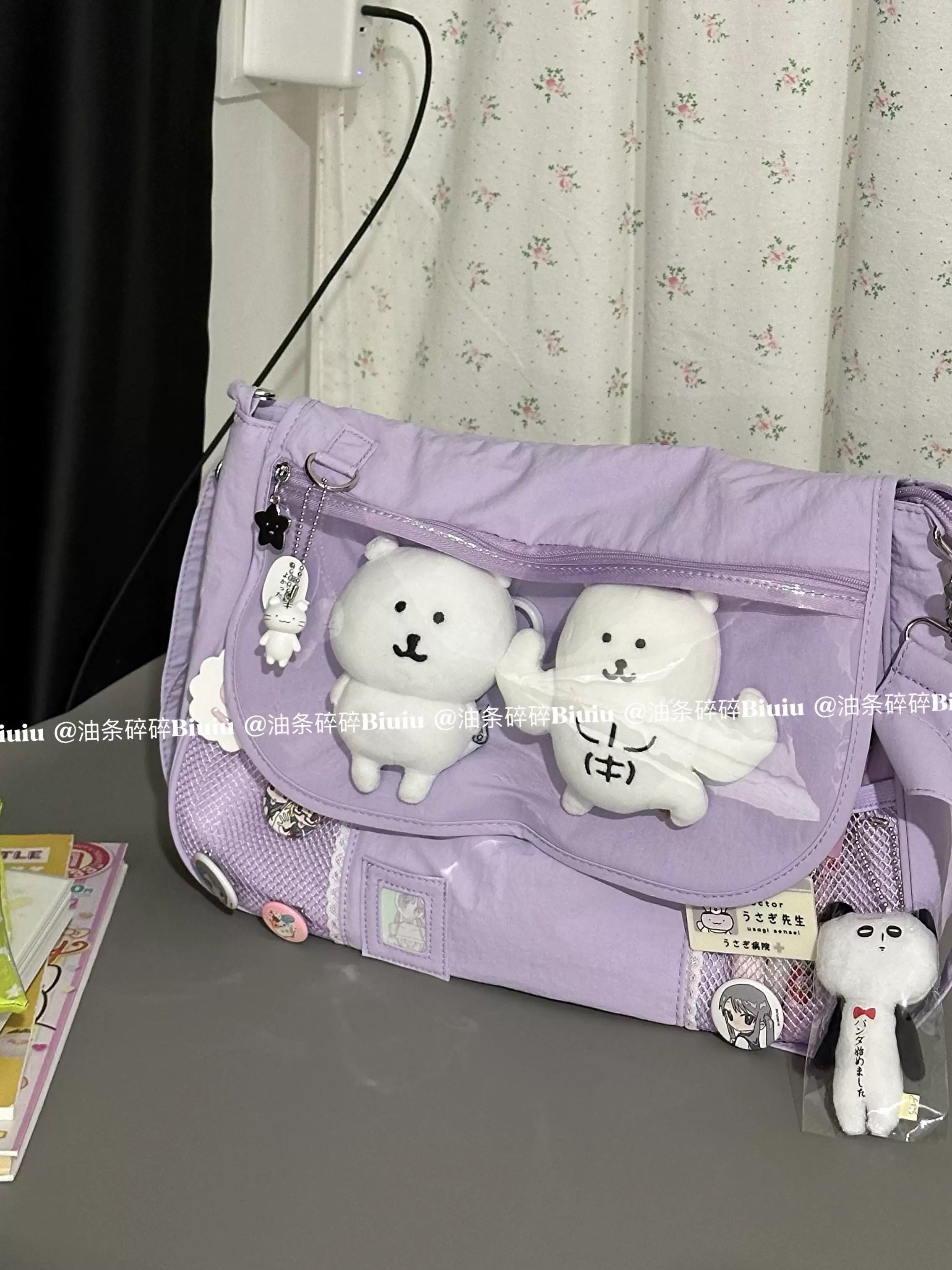 翻蓋痛包紫色尼龍斜挎包