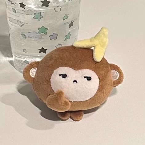 中指猴蛋毛絨掛件