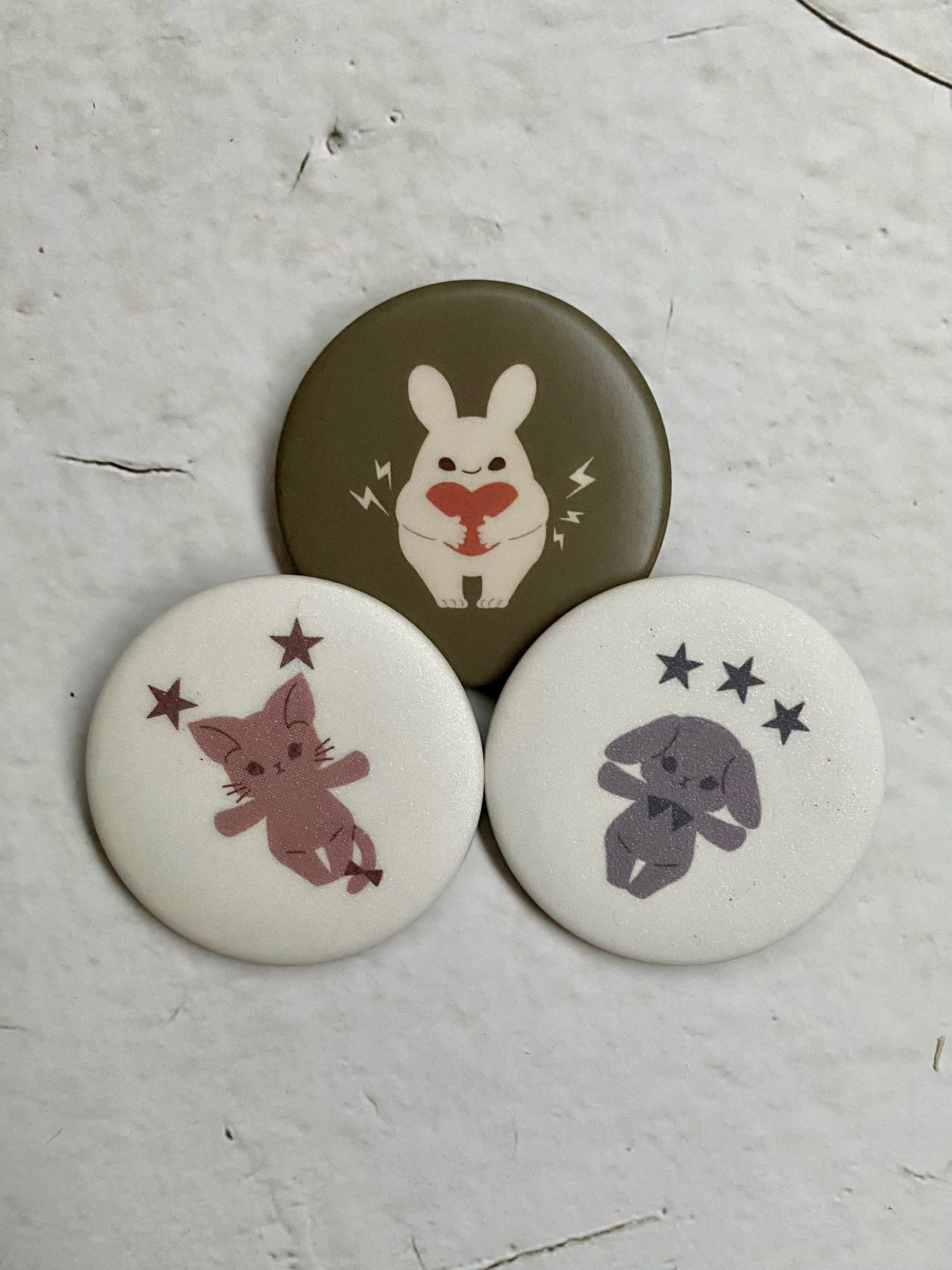 心電＆星塵胸章
