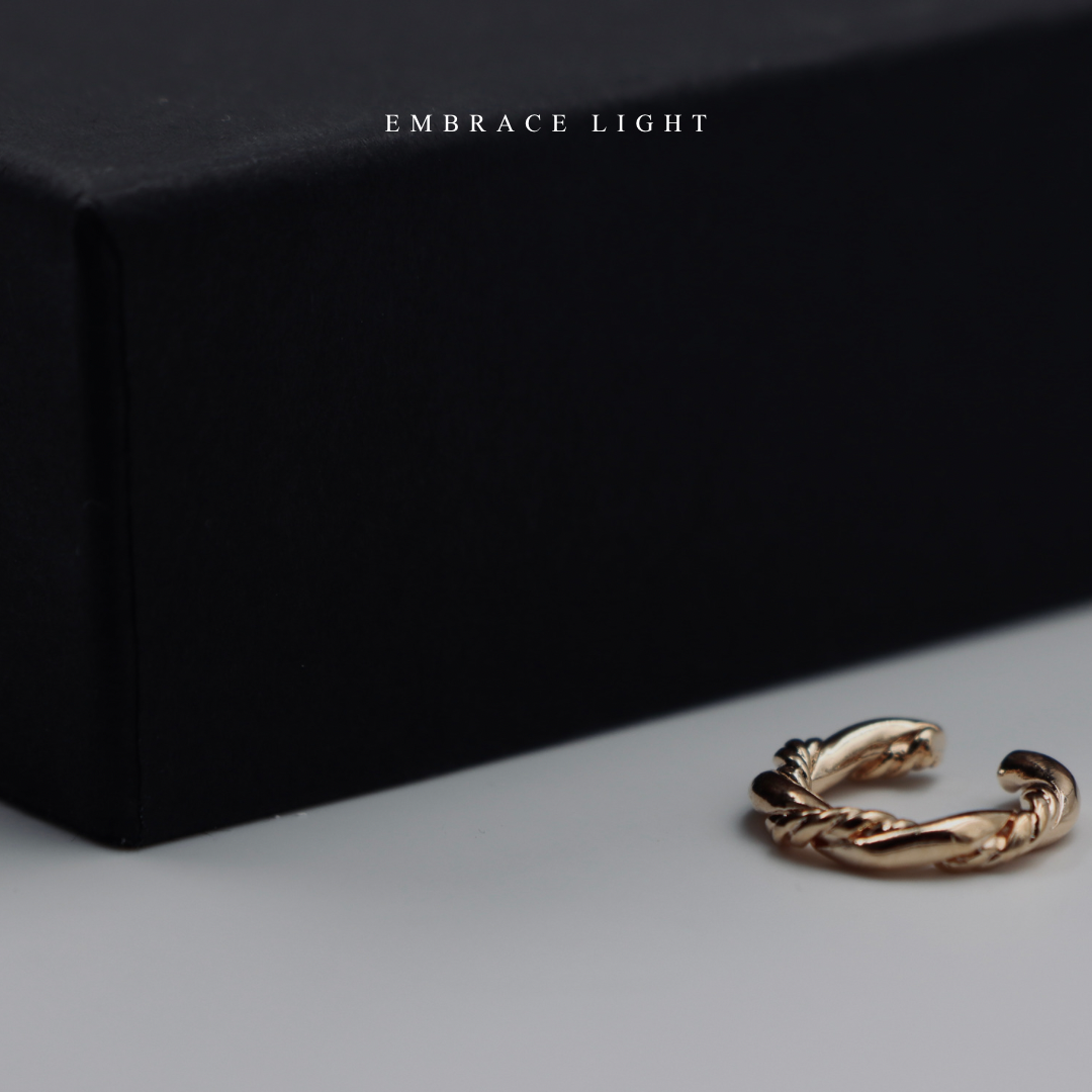 扭絞〔耳骨夾〕