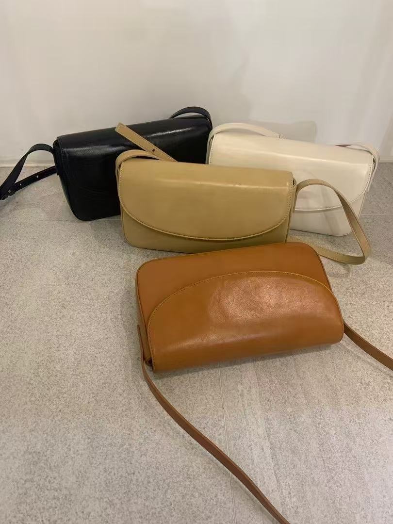 5:55👼200%全牛皮 toae韓國設計師品牌代購-Milk bag長型翻蓋肩背包側背包