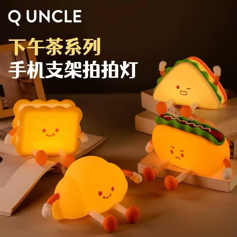 超可愛牛角包手機支架拍拍燈