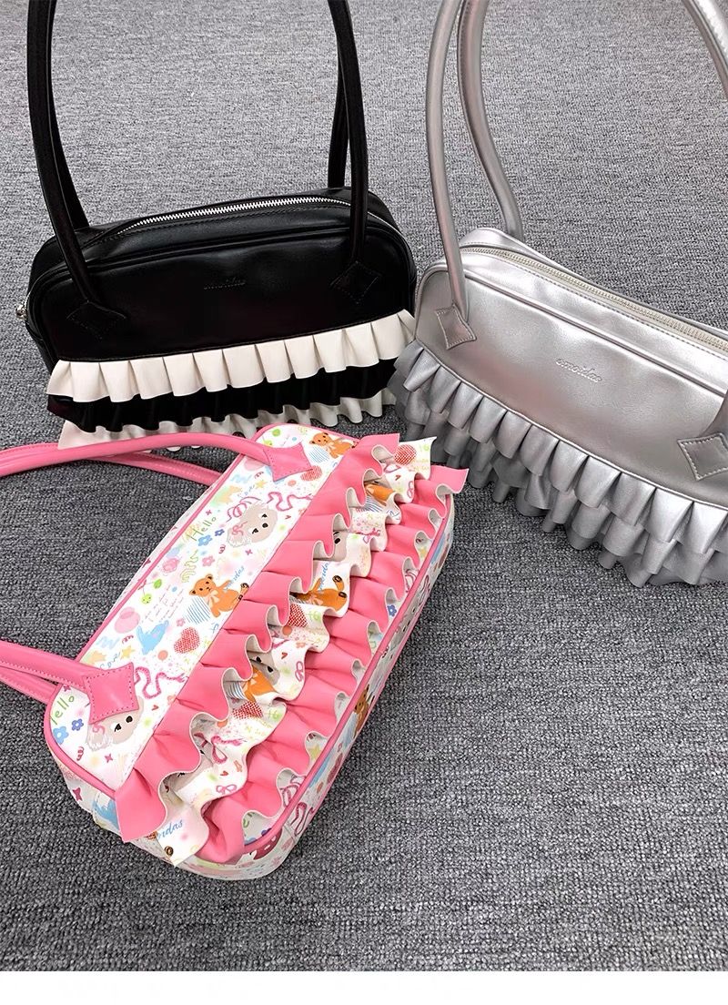 裙擺躍動手提單肩pu包