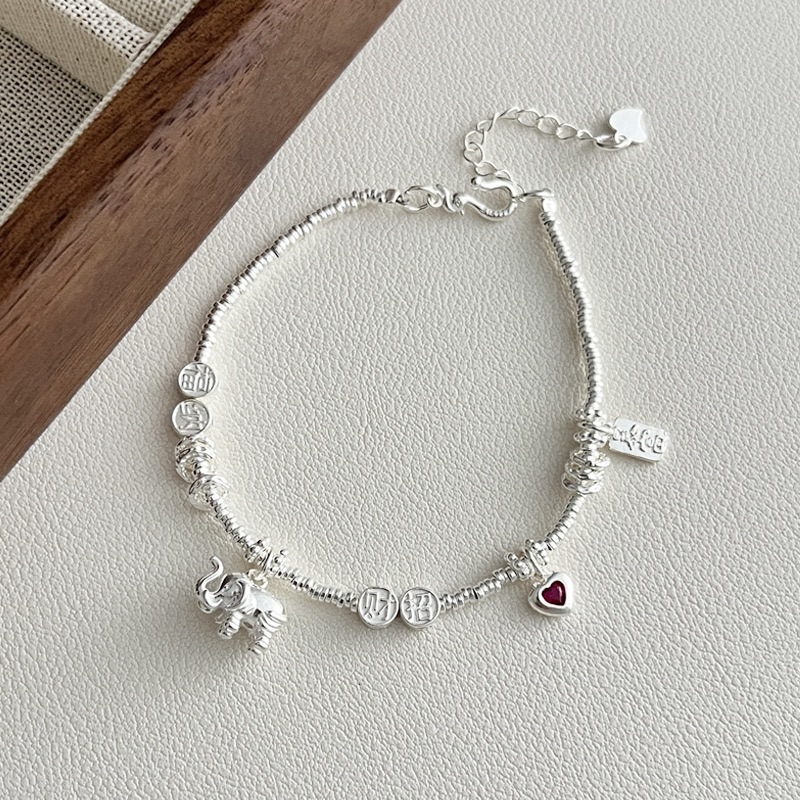 999純銀盤纏大象手鍊