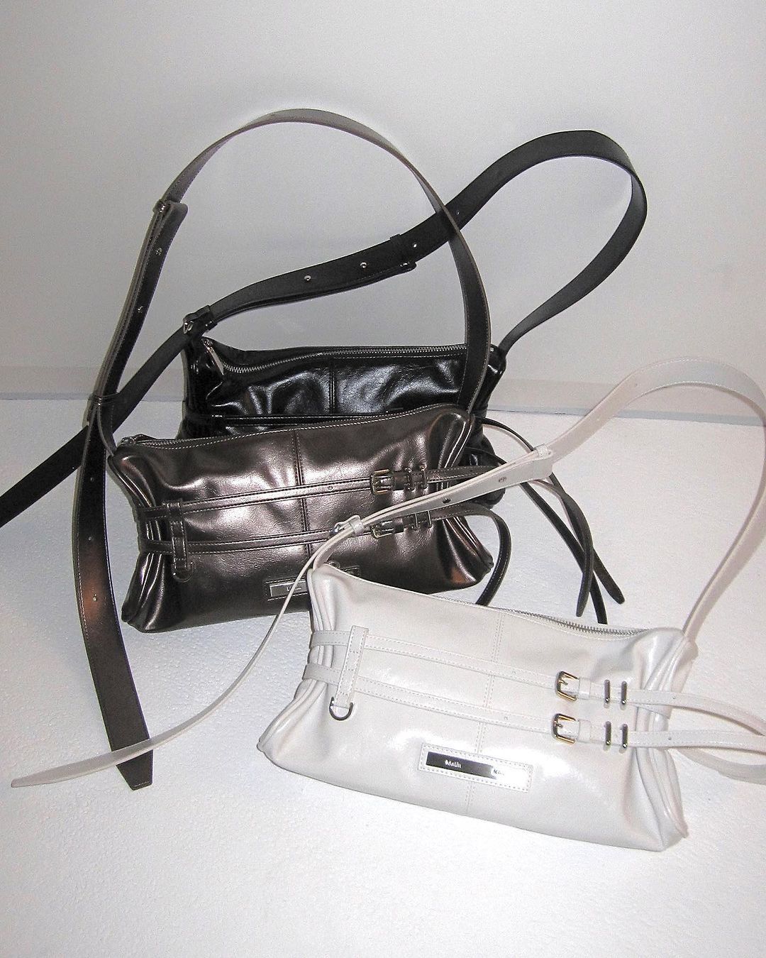 MATIN KIM DOUBLE BELTED STRAP MINI BAG