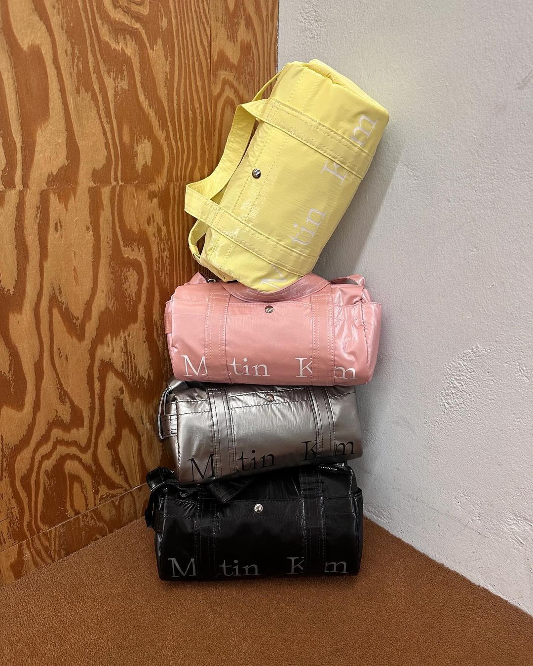 MATIN KIM GLOSSY LOGO S PORTY MINI DUFFEL BAG IN