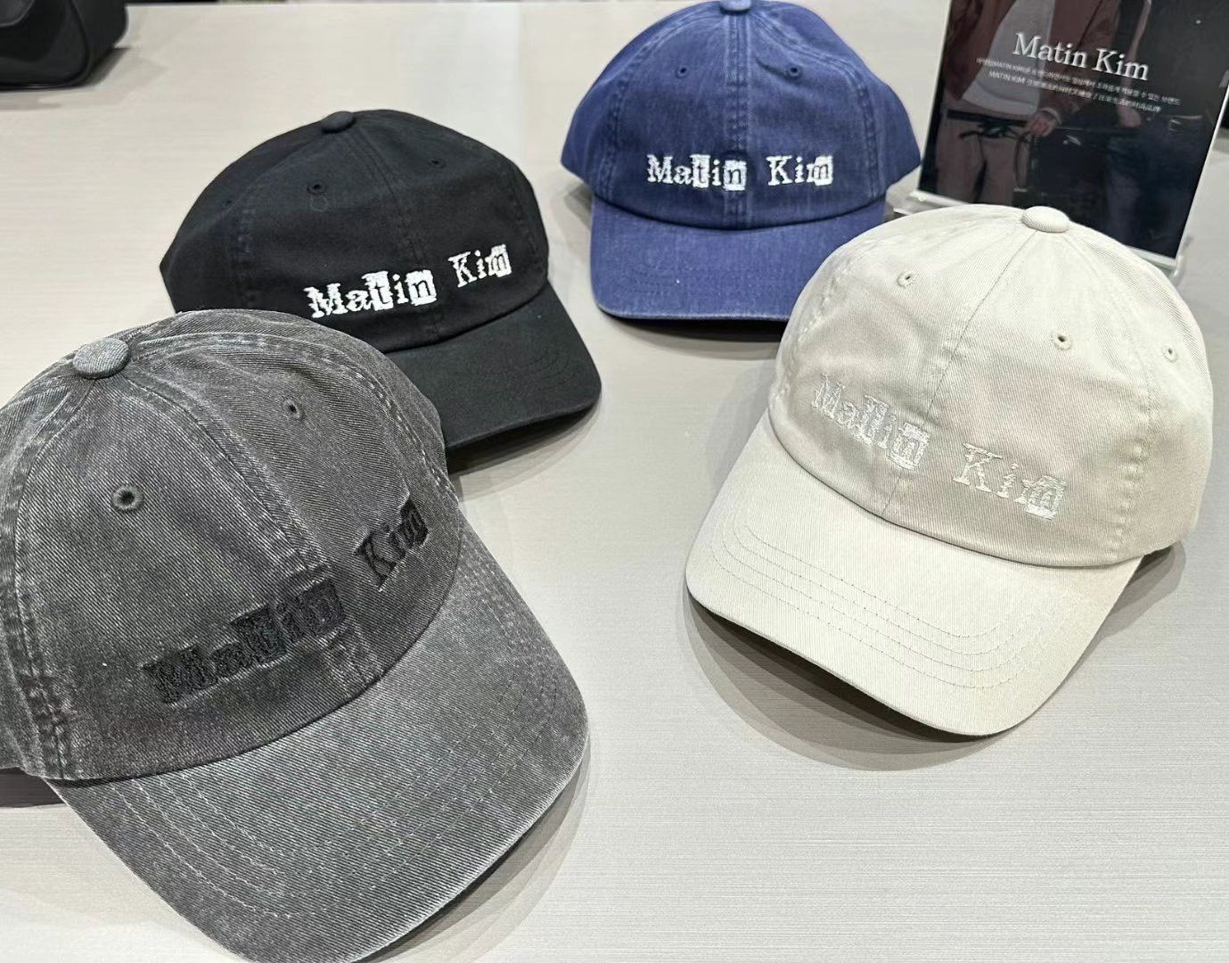 MATIN KIM  LOGO SCRAP BALL CAP IN