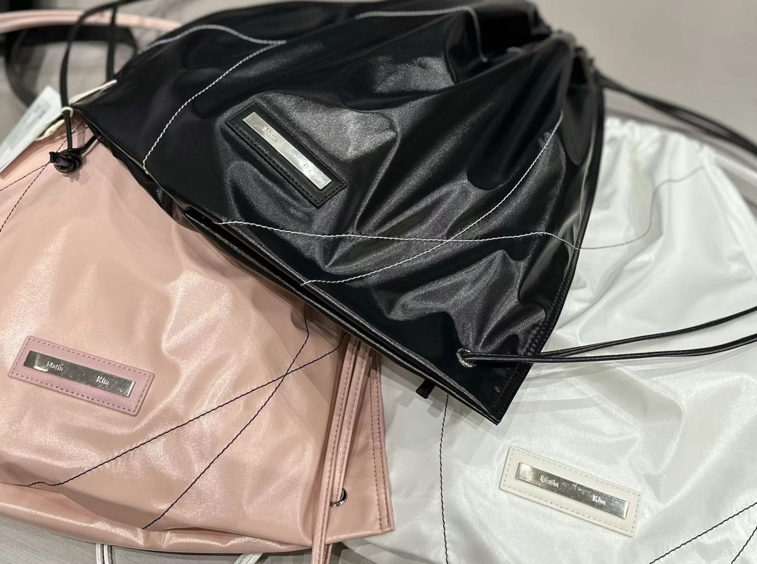 MATIN KIM STRING COATING BACK PACK IN