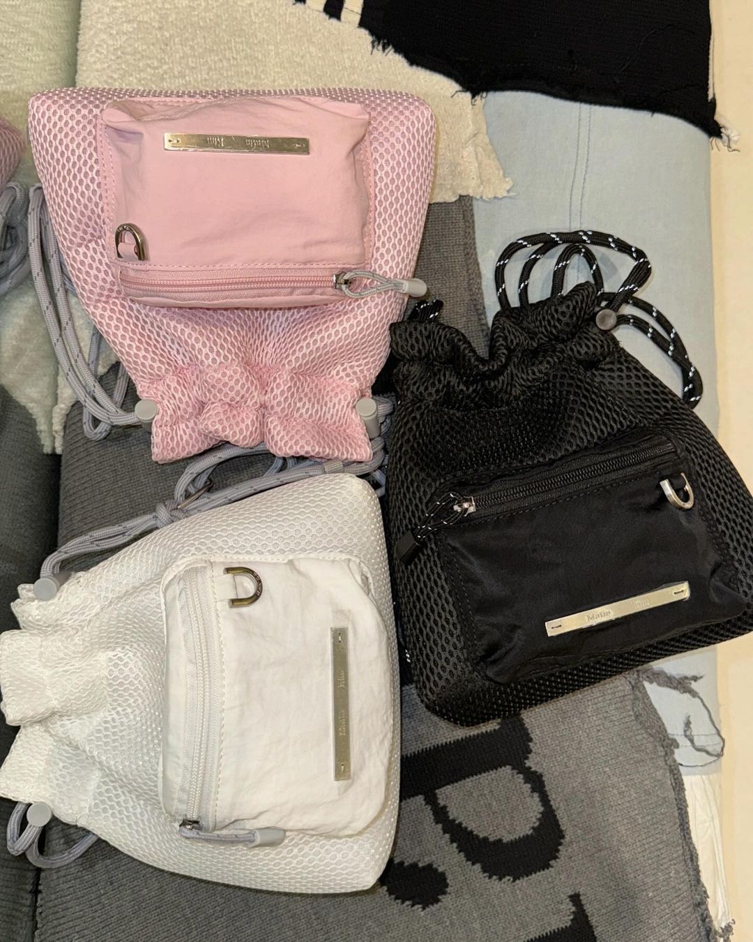 MATIN KIM CARGO MESH CROSS BAG