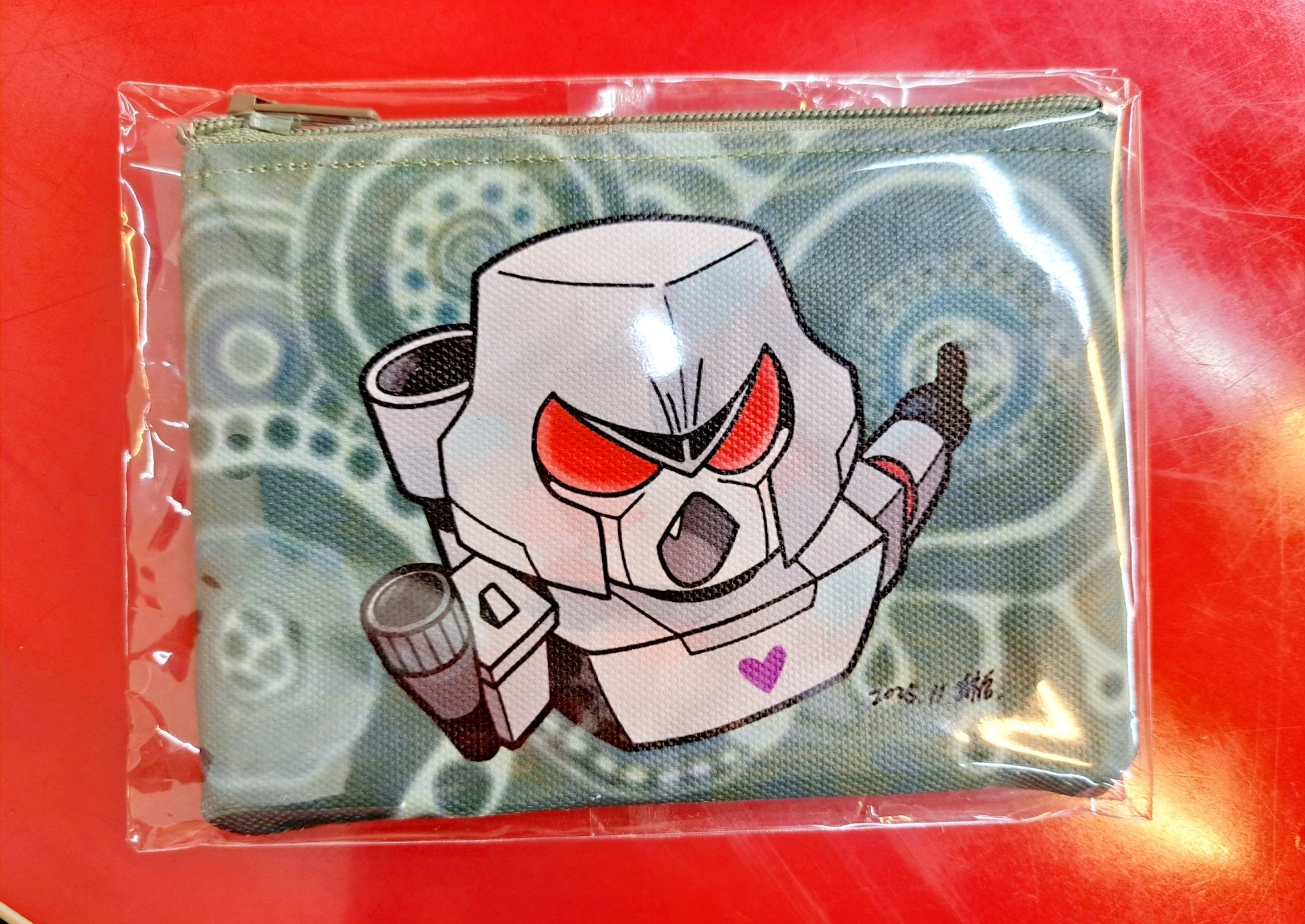 變形金剛手作小錢包 （拍得很醜但我懶得修圖了對不起）