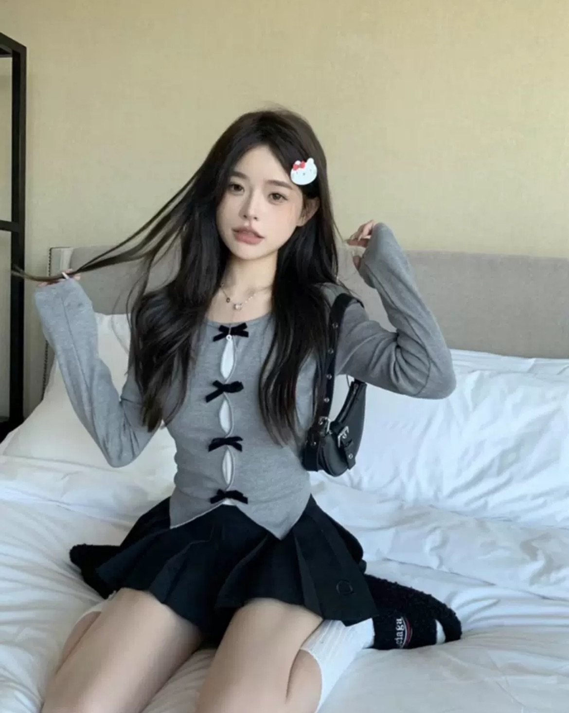 假兩件鏤空蝴蝶結長袖T恤女春季2024新款不規則修身短款辣妹上衣