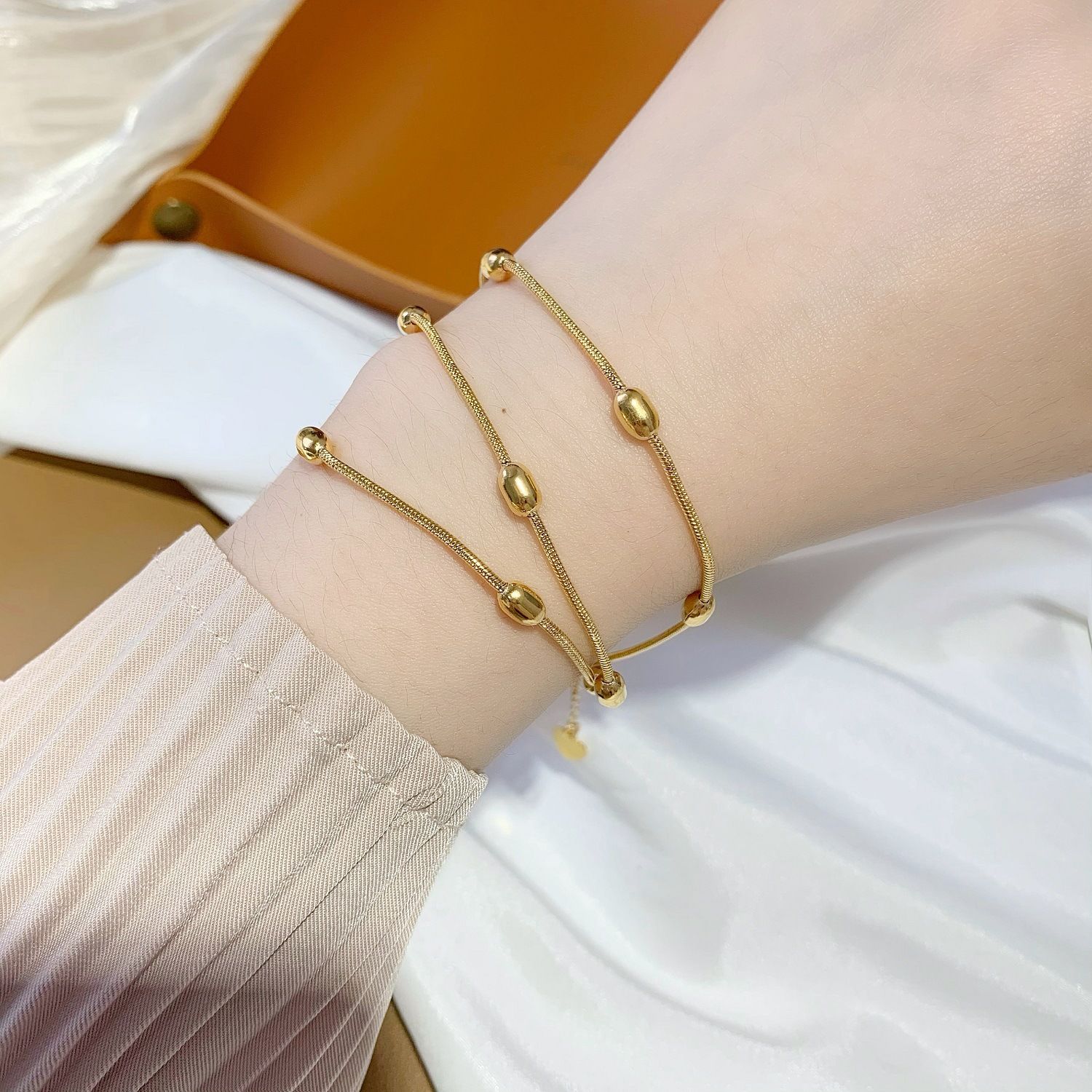 三層小金豆轉運手串SL1034