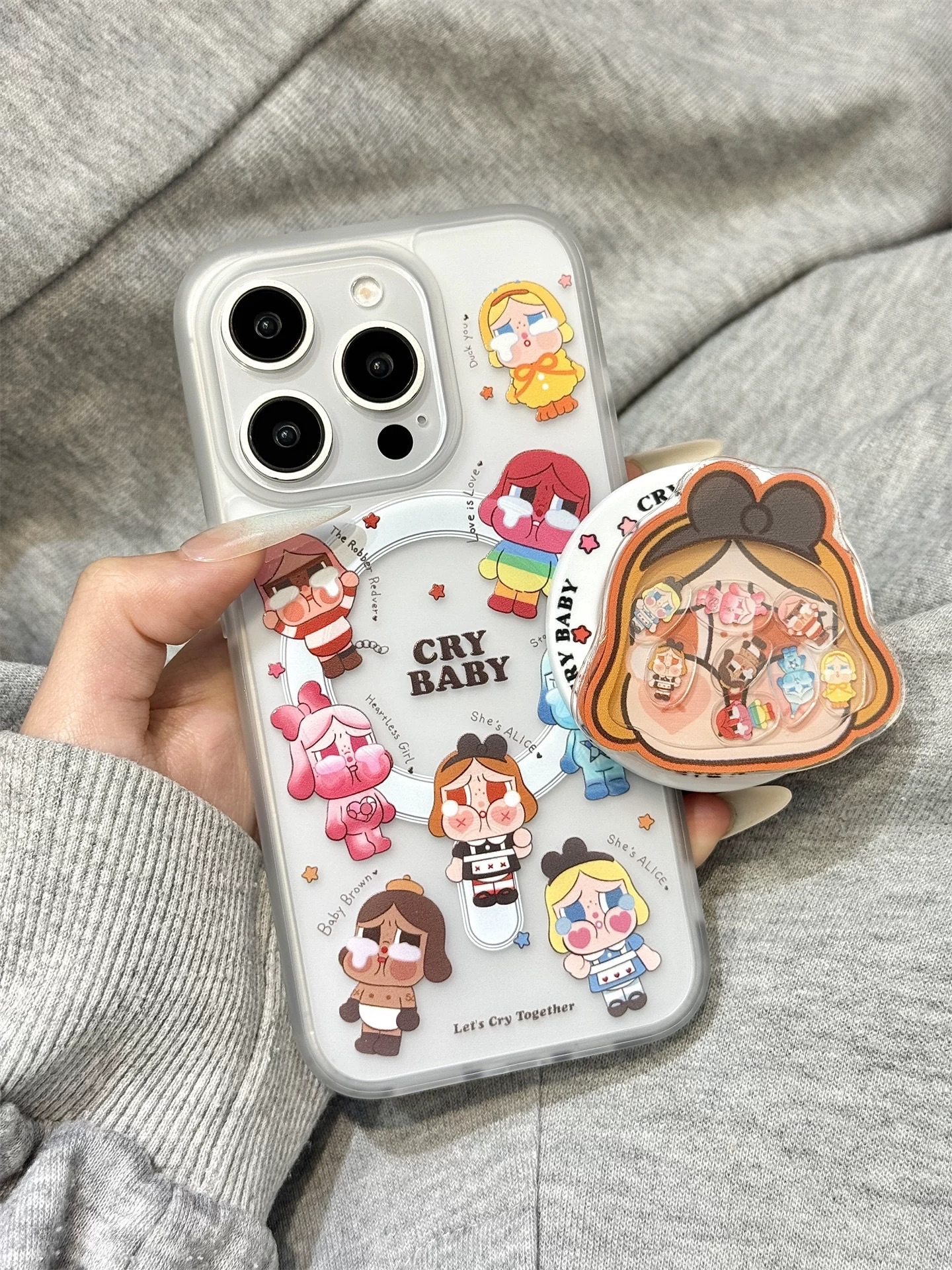 愛麗絲支架+哭娃手機殼