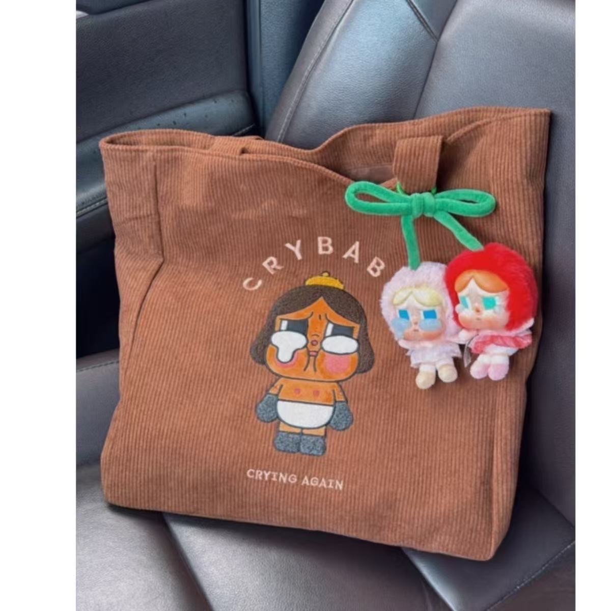 初生黑哭哭手提袋