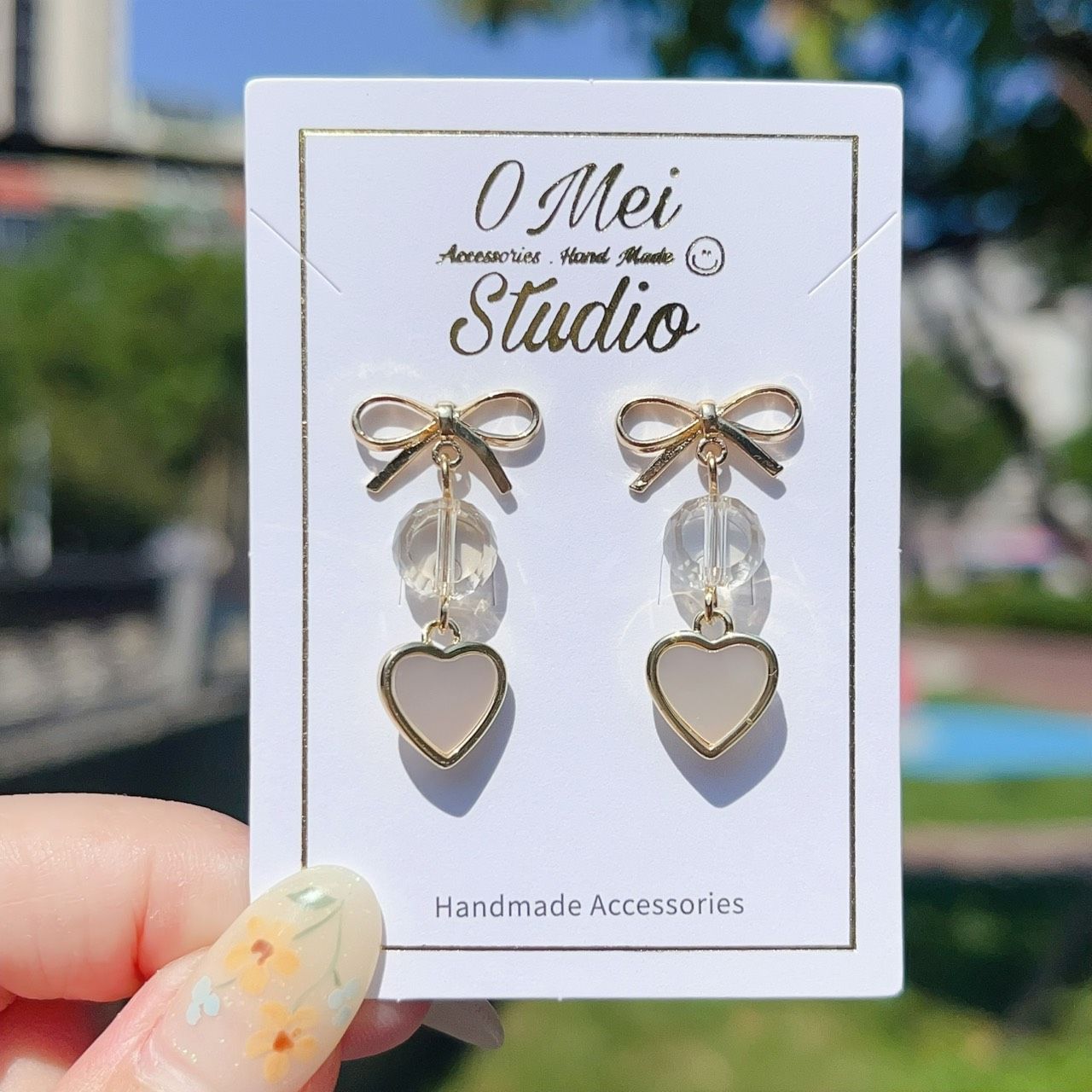 手作耳環-蝴蝶結切面玻璃珠愛心吊墜耳環