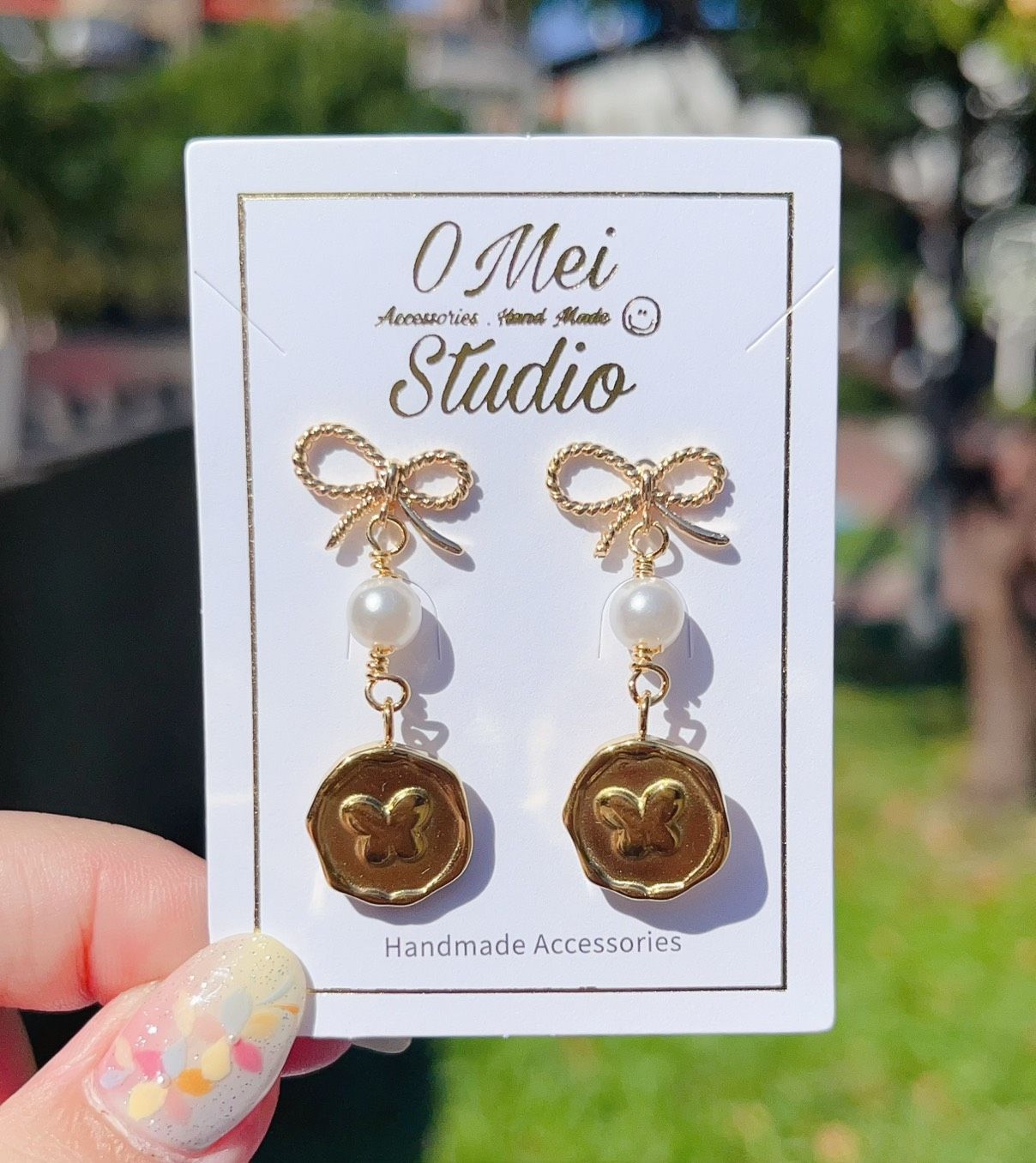 手作耳環-蝴蝶結貝殼珠耳環