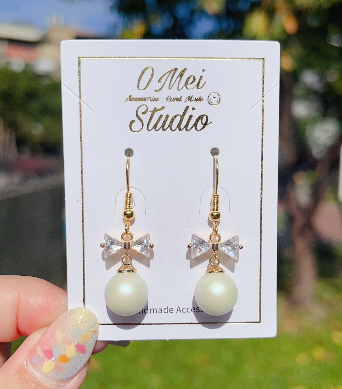 手作耳環-水鑽蝴蝶結霧面圓珠耳環