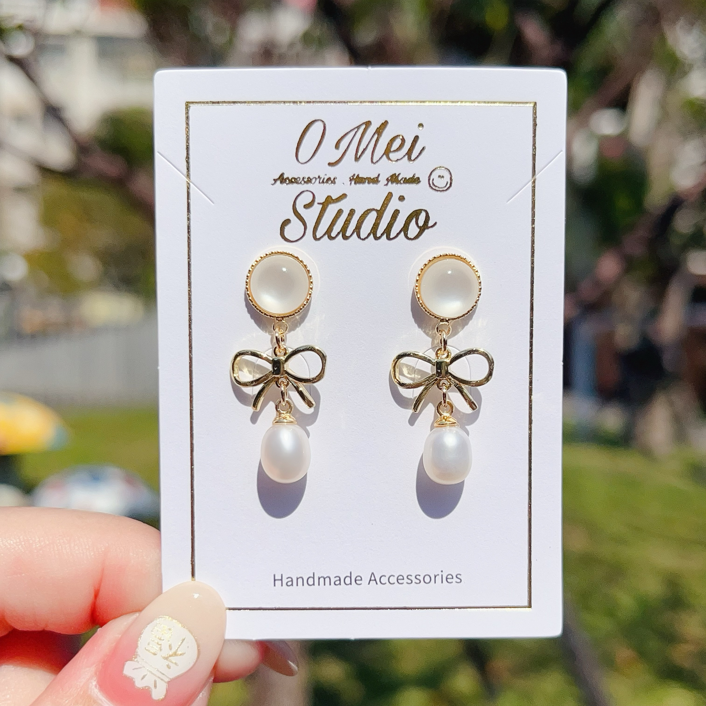 手作耳環-2026.02新品-貓眼蝴蝶結淡水珍珠耳環