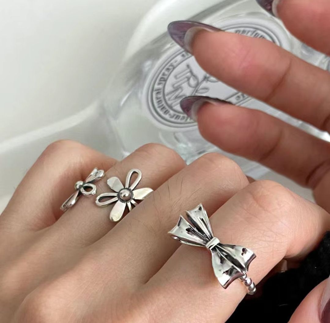 S925鍍銀戒 蝴蝶結雛菊交響曲