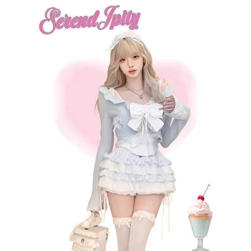 少女椰子 水色泡沫 秋季奶藍色針織開衫+蝴蝶結吊帶+白色蛋糕褲裙