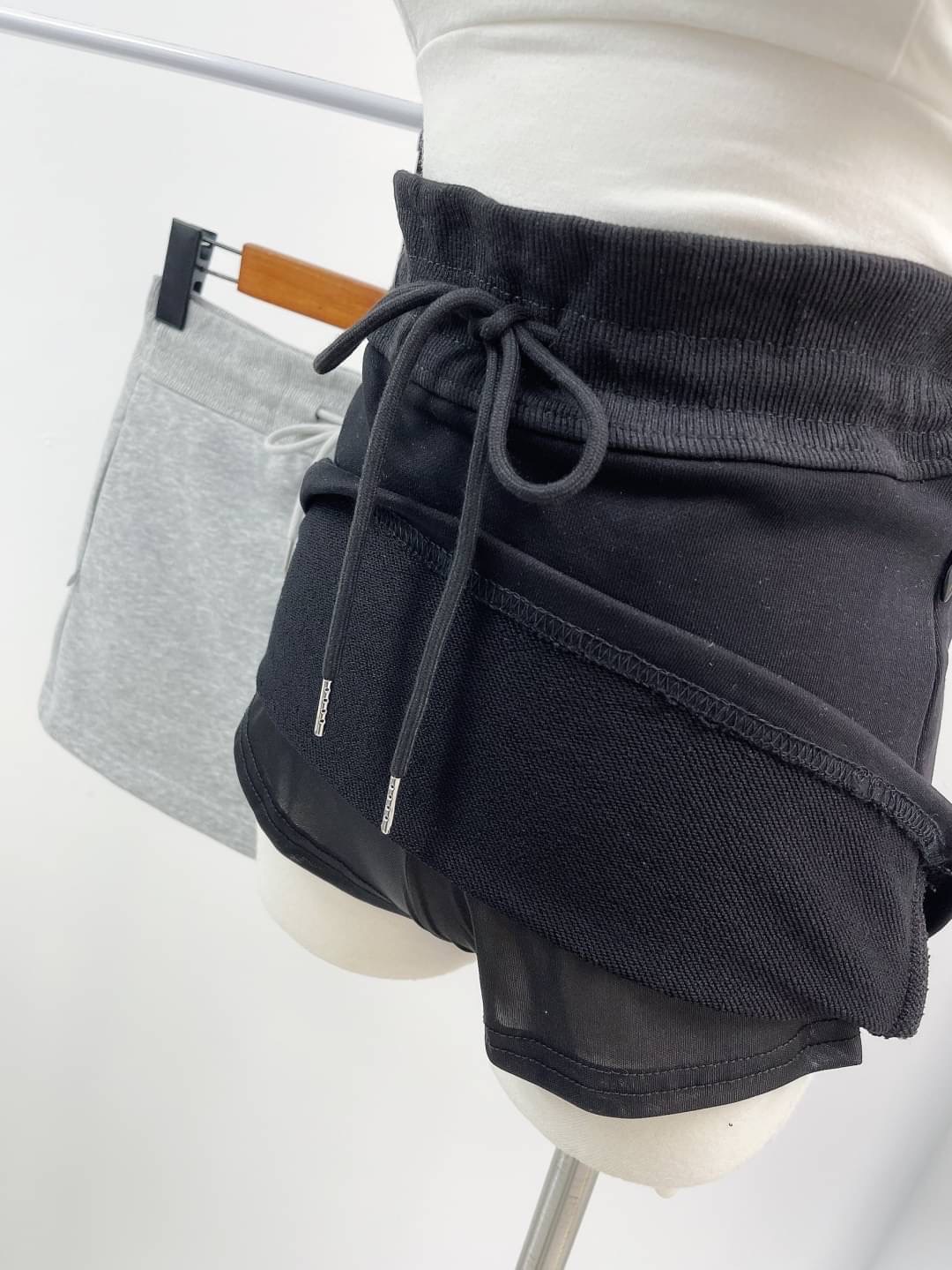 辣妹抽繩包臀褲裙