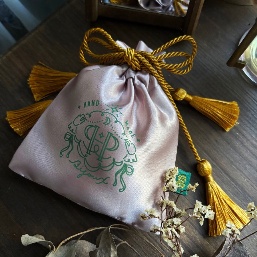 流蘇緞面束口袋