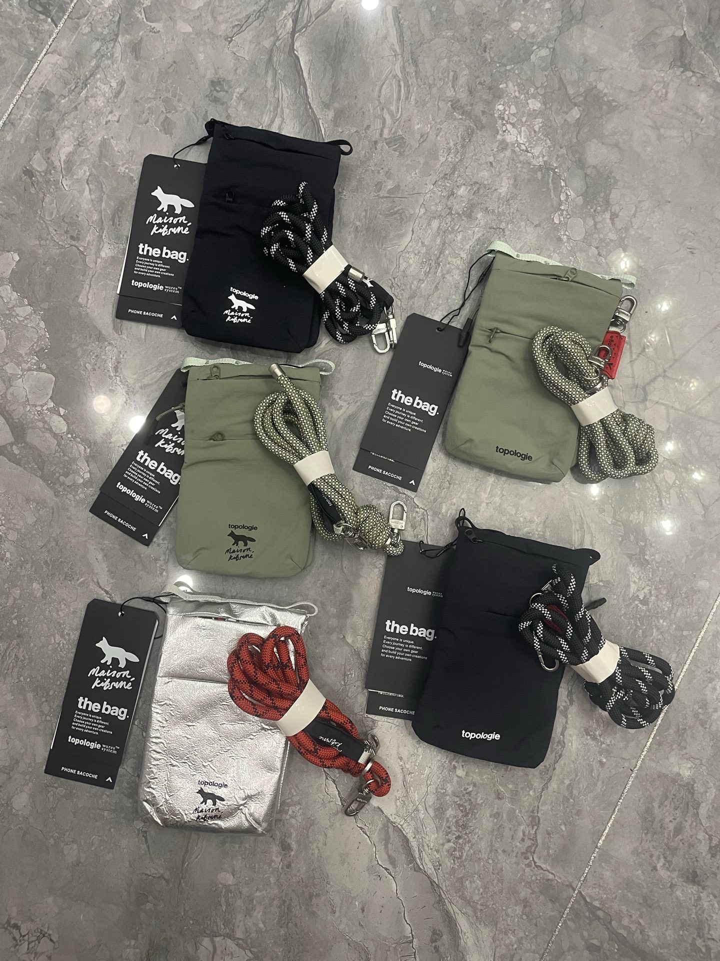 101103團購不退換預購 「不代表品牌」 配繩多口袋手機包