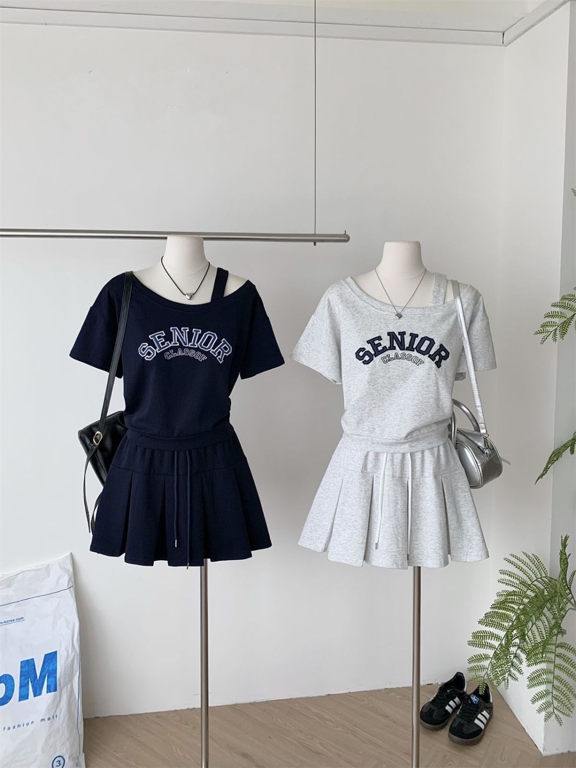 完美套裝🤍氣質休閒單露肩短上衣+半百褶短裙兩件套