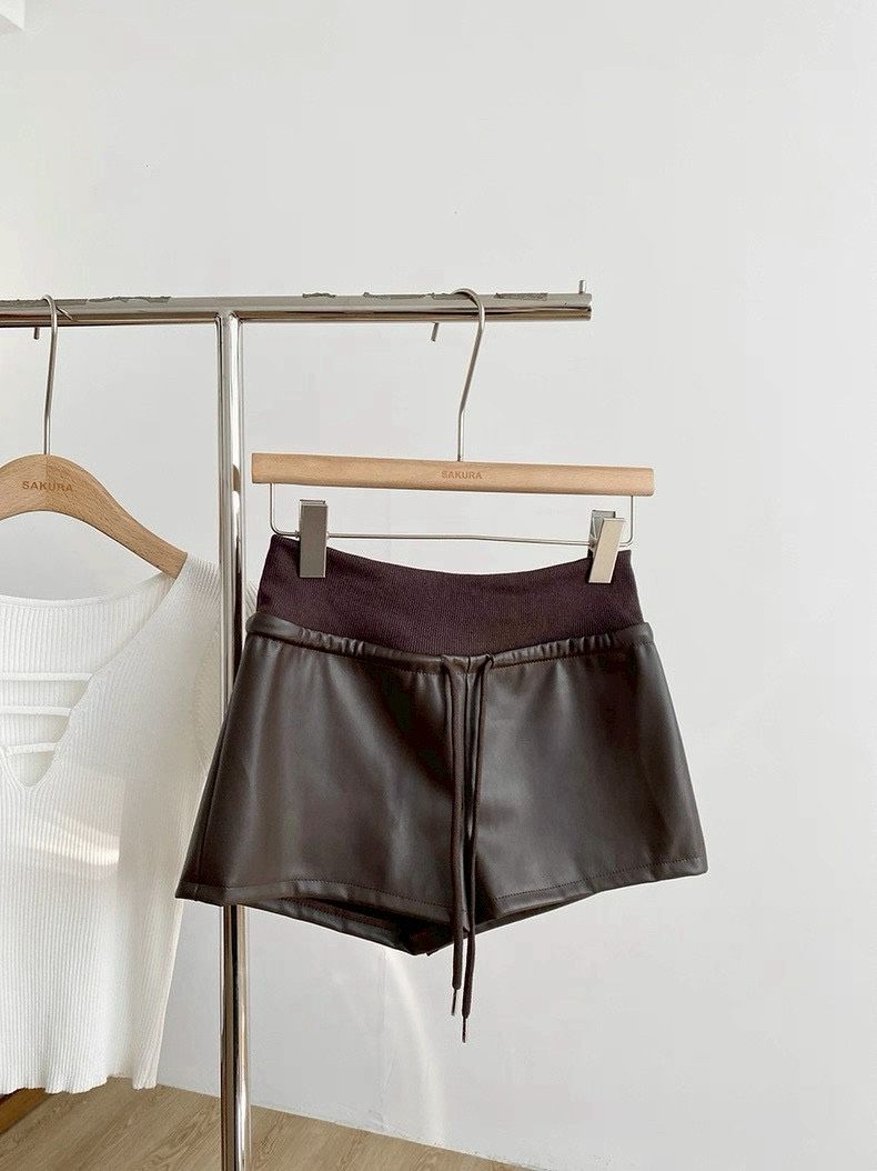 現貨秒出💫鬆緊拼接皮褲