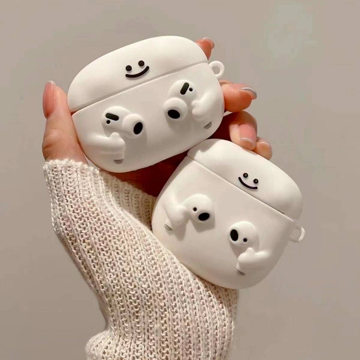 白色拿耳機小人造型耳機殼