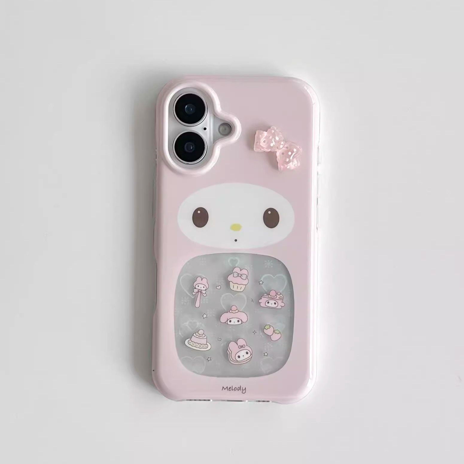 11 p.m.| 粉粉可愛 鏤空鐳射愛心美樂蒂 立體蝴蝶結 iPhone手機殼（14-17， 13/14通用）