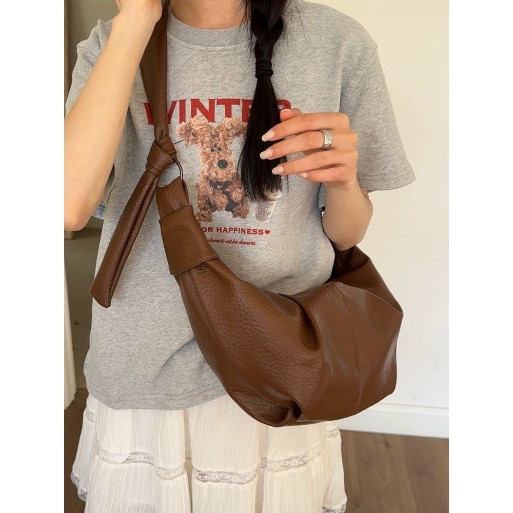 韓系軟皮大容量牛角造型通勤斜背包