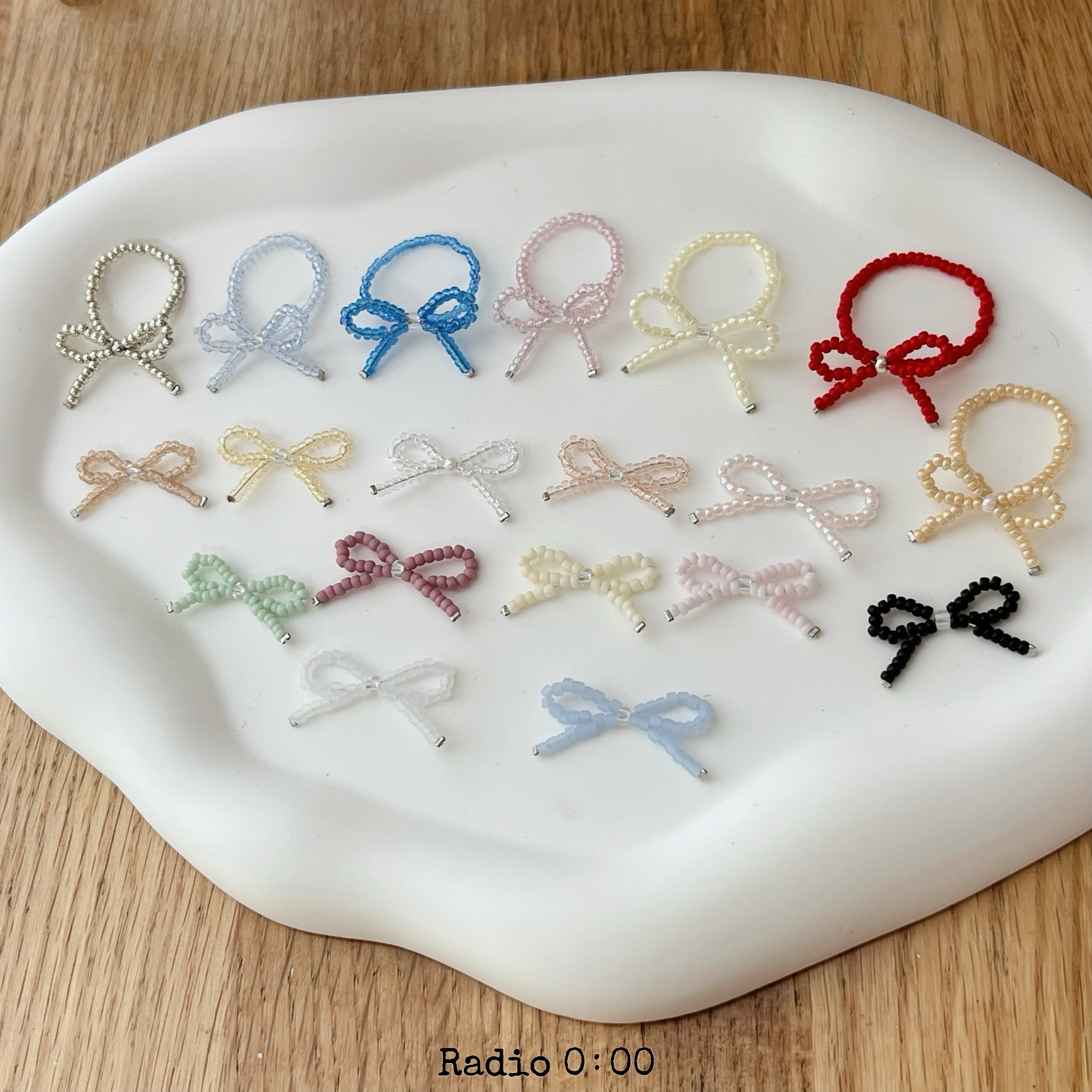 B03米珠蝴蝶結戒 固定戒圍