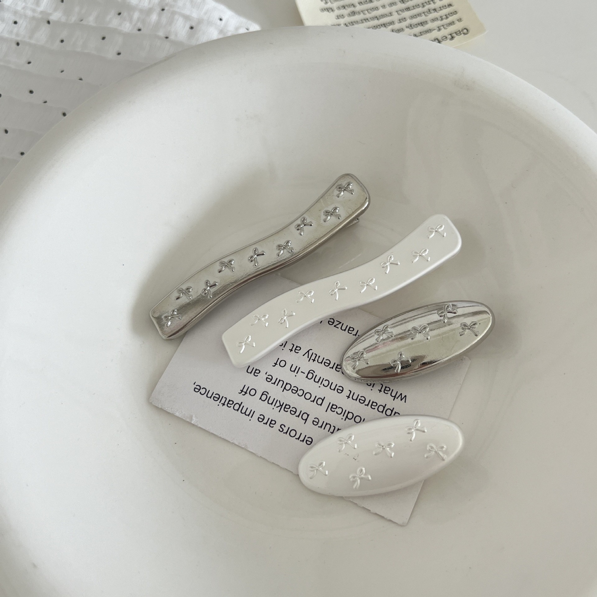 韓國蝴蝶結滿版鋼印質感銀色髮夾