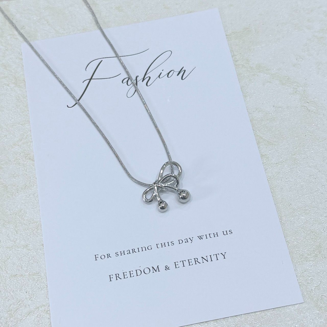 （3月新品） 叮咚蝴蝶結項鍊*鈦鋼（不鏽鋼.醫療鋼.西德鋼）