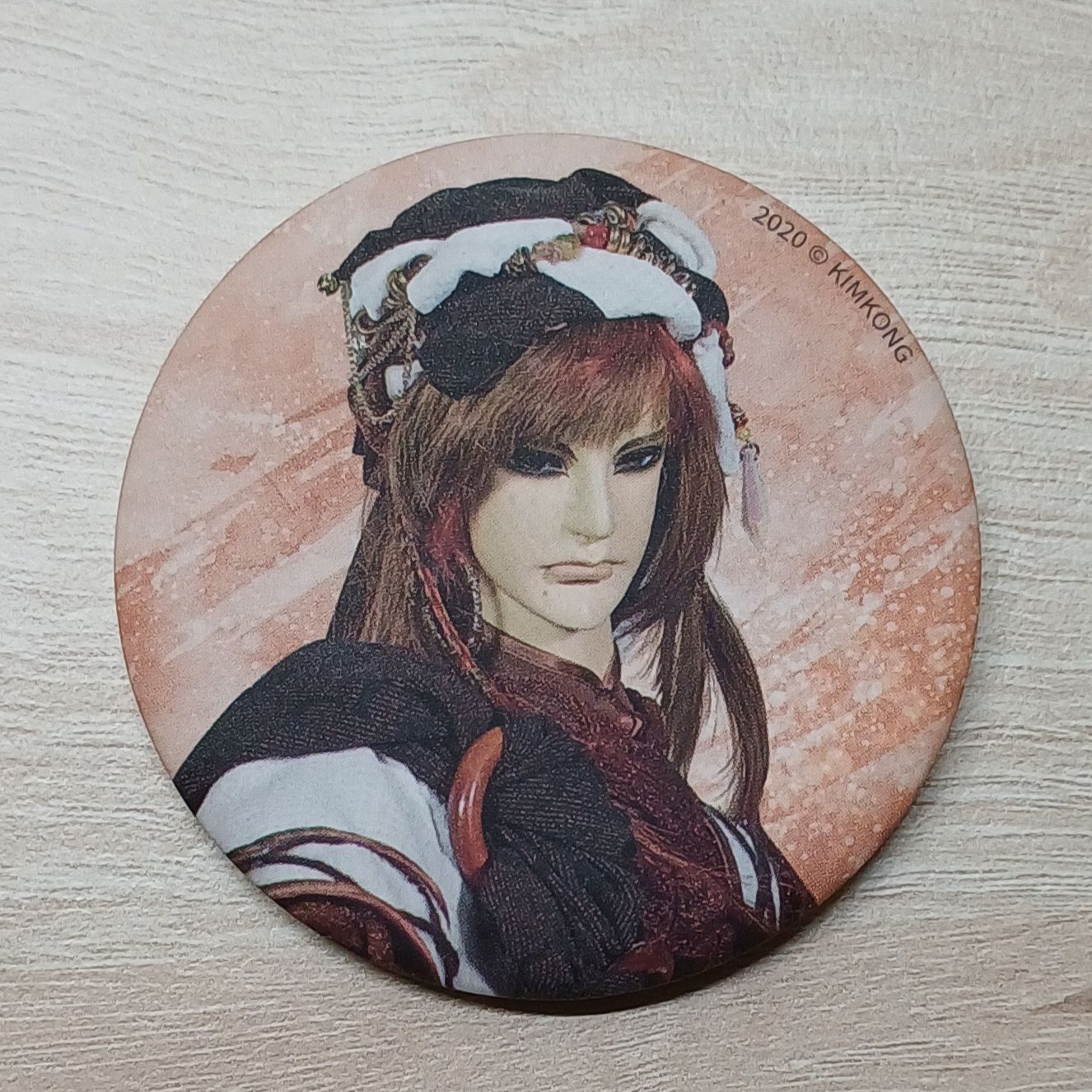 無情葬月、朧三郎徽章