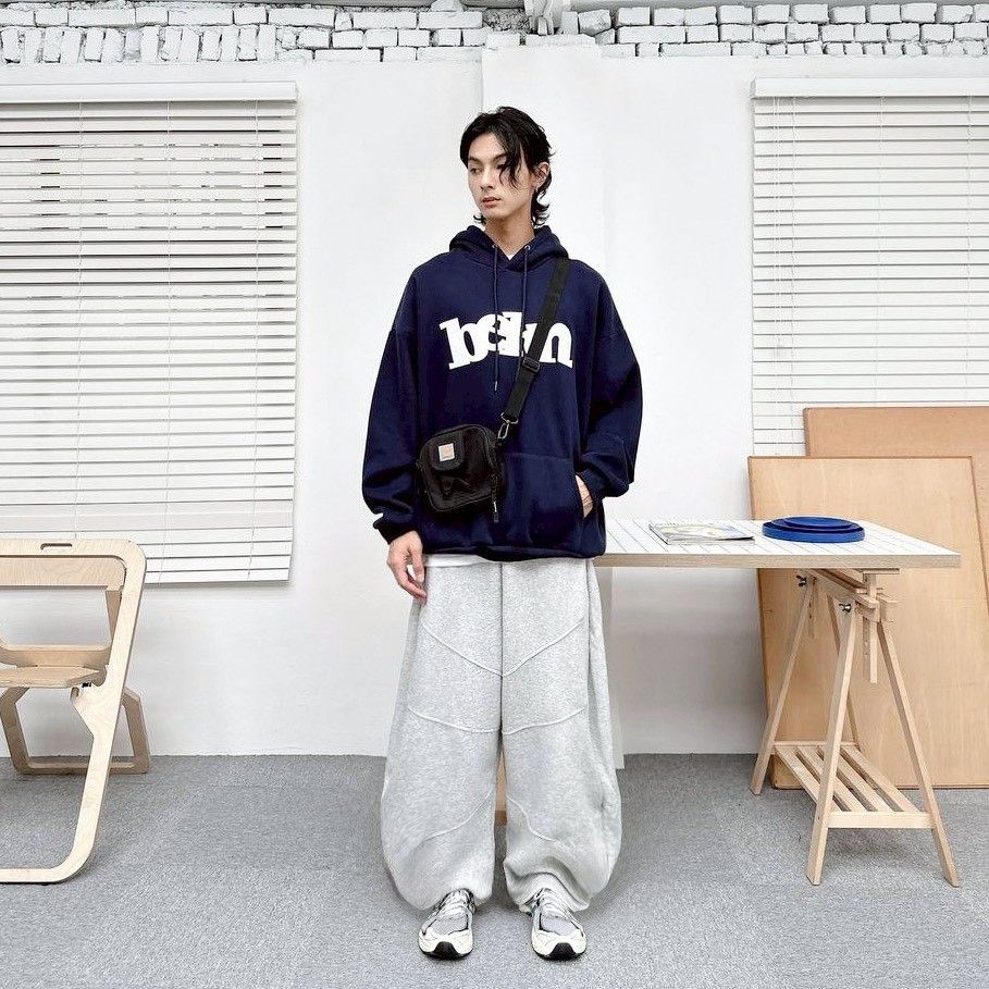 斜痕浮空剪裁彎刀棉褲