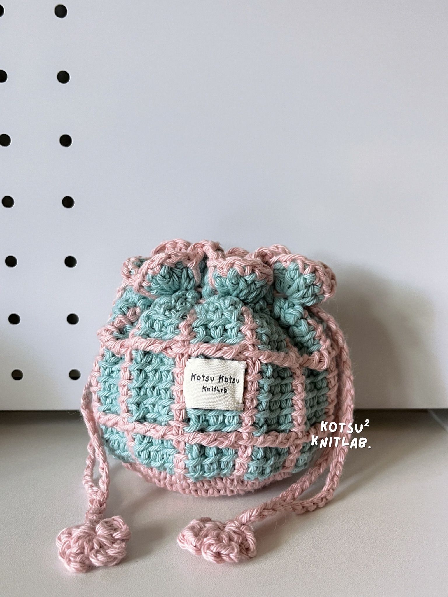 圓滾滾的菠蘿麵包束口袋