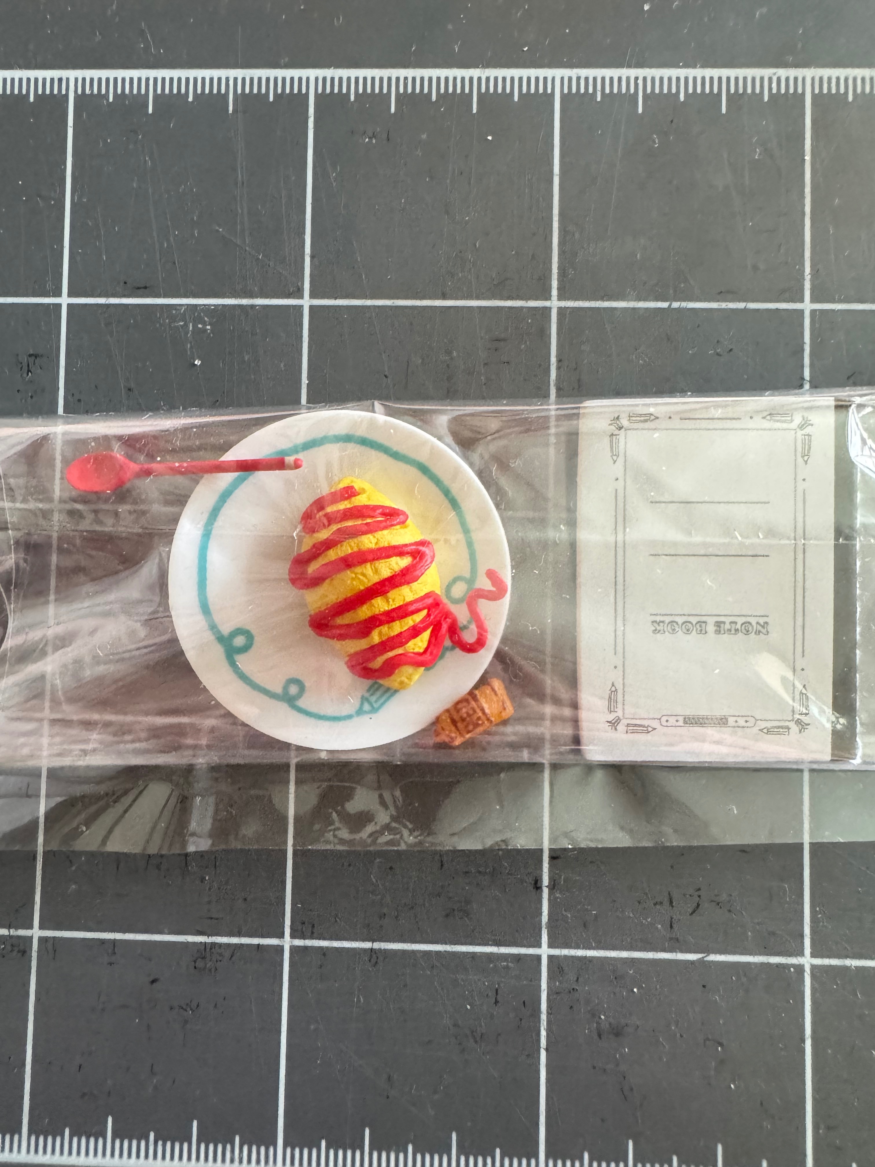 蛋包飯和筆記本（無紙無盒）