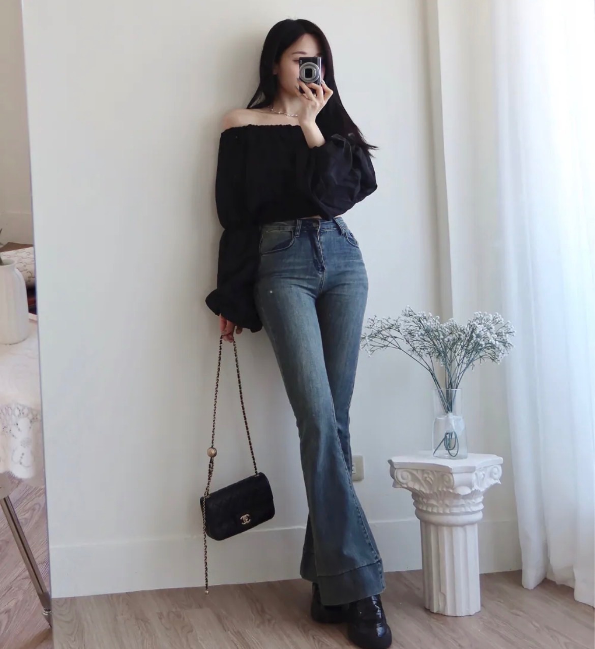 黑色泡泡袖一字肩上衣