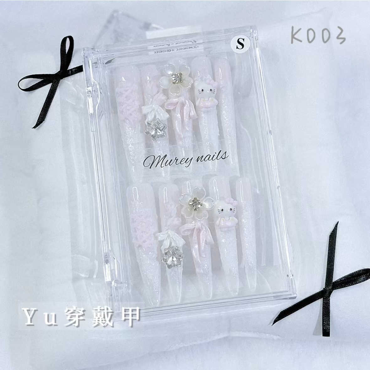 K003